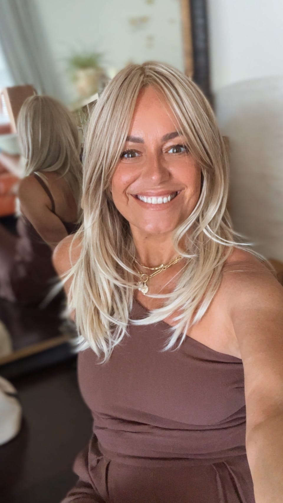 Samantha smiling indoors